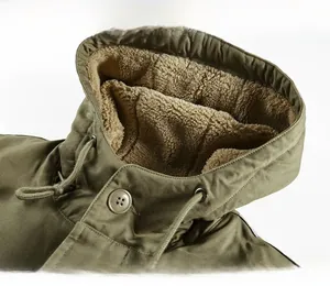 Detail view of winter parka featuring thick beige lamb wool lining and drawstring hood
