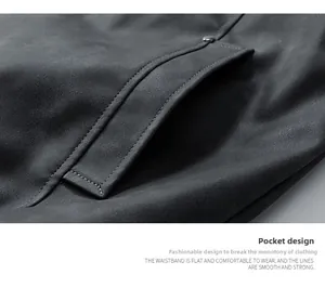Close-up detail of smooth pocket stitching and premium matte leather texture on men jacket
