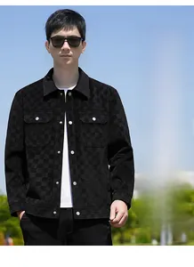 Detail shot of men's black suede jacket featuring checkered texture and silver metal buttons