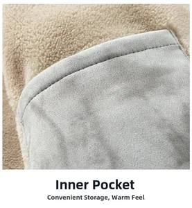 Detailed close-up of warm beige sherpa fleece lining and functional inner pocket stitching