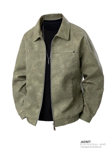 Close-up of olive green retro PU leather flight jacket with metallic zipper and matte texture