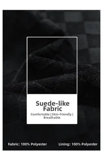 Detailed macro view of black faux suede fabric with a textured checkerboard pattern