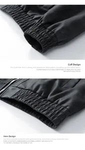 Detail of elastic cuffs and hem stitching on a slim-fit faux leather motorcycle jacket