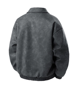 Detailed back view of a dark grey slim-fit suede biker jacket with elastic hem and classic collar