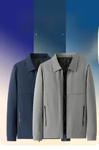 Detail view of quilted padded lining and zipper pockets on men's business casual jackets
