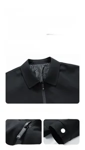Detail view of business jacket featuring metal zipper and quilted lining for warmth