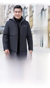 Detailed view of the exquisite stitching and tailoring process for men's winter jackets