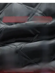 Close-up of diamond quilted fabric with warm cotton padding for winter men jacket