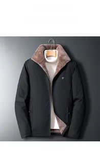 Close-up of the thick brown faux fur lining and windproof fabric of the men's winter jacket