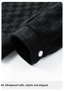 Detailed macro view of windproof sleeve cuffs with metal button and checkerboard texture