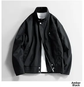 Detail of Amber Black men's jacket showing stand collar and zippered chest pocket