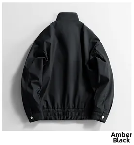 Amber black windproof jacket with elastic hem and white metal buttons on the cuffs