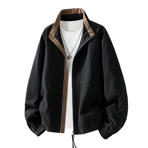 Men's black casual jacket with stand collar and brown lining detail in a loose fit style