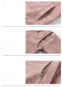 Macro detail of pink suede jacket featuring contrast stitching and metal zipper hardware