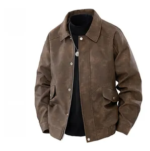 Detail view of retro brown PU leather jacket with snap buttons and large flap pockets