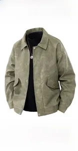 Detail of vintage pea green faux leather jacket featuring lapel collar and zip pockets