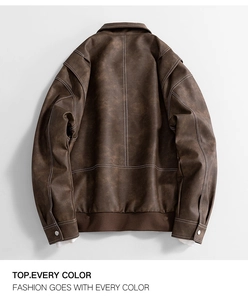 Detail view of dark brown faux leather jacket back with contrast white stitching detail