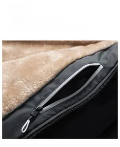 Detail of winter jacket showing warm fleece lining and hidden interior zipper pocket