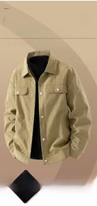 Detail of khaki men's workwear jacket featuring vertical pleated texture and 3D buttons
