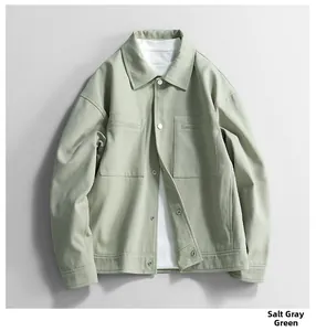 Detail view of Salt Ash Green casual jacket showing collar, pockets and cotton twill texture