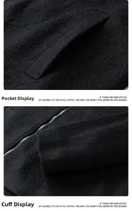Detail view of plush black faux fur jacket showing the metal zipper and side pocket texture