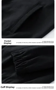 Detail view of the waffle knit jacket showing pocket design and elastic cuffs in black