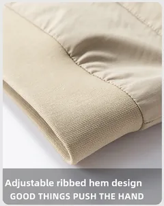 Detail of khaki jacket ribbed hem showing high-quality twill fabric and fine stitching