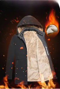 Detail of winter parka with warm fleece lining and protective hood for outdoor comfort