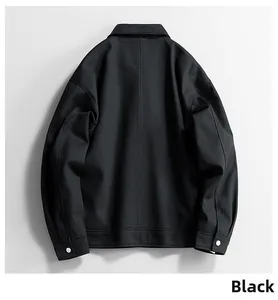 Rear view of minimalist black windproof jacket with shirt collar and metal button cuffs