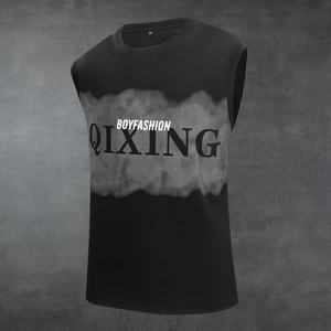 Close-up of black sleeveless t-shirt with BOYFASHION print and texture details