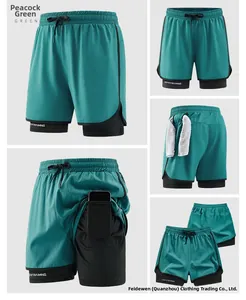 Detail of 2-in-1 sports shorts showing phone pocket, towel loop, and peacock green fabric