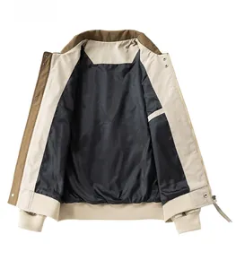Detail of bomber jacket featuring interior pocket and smooth black polished lining