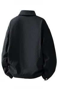 Macro view of the black men jacket back featuring unique vertical textured pleat fabric