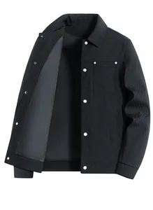 Detail view of black casual jacket featuring a shirt collar and silver snap button closure