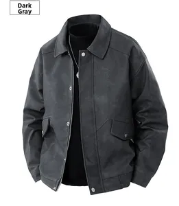 Detail of dark gray men's PU leather jacket with large flap pockets and metal button closure