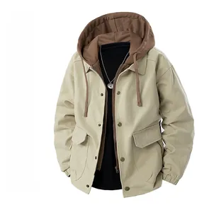 Detail of khaki hooded cargo jacket with dual-layer brown hood and large chest pockets