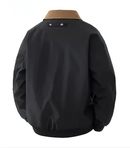 Detail view of black vintage pilot jacket back with brown collar and metal eyelets
