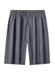 Detail view of dark grey athletic shorts with elastic waistband and high-quality stitching