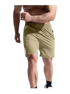 Running shot of men's quick-dry sports shorts with elastic waist and zipper pockets