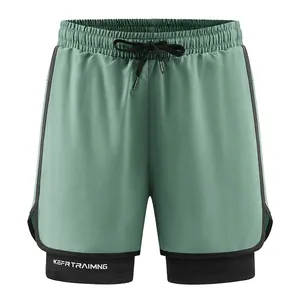 Men's 2-in-1 sage green quick-dry athletic shorts with black compression liner and drawstring
