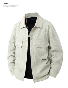 Detail of retro functional jacket featuring textured fabric and flap chest pockets