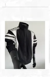 Detailed view of color-block casual jacket with stand collar and zipper closure for men