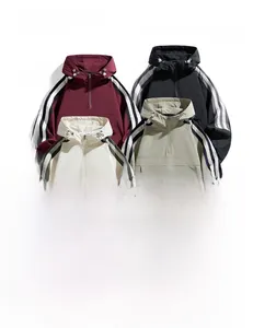 Detail of four windbreaker jackets showing multi-color options with stripe sleeve design
