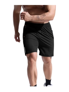 Detail of men's black quick-dry sports shorts with elastic waist and reflective strip
