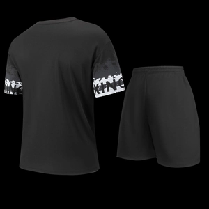 Detail of KING letter print and white splash design on black sport t-shirt sleeve