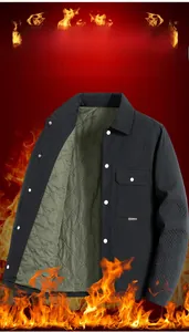 Detail view of men's dark gray jacket showing olive green quilted lining and metal buttons