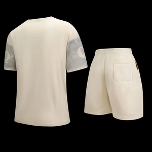 Detail view of the back of casual summer two-piece set with tie-dye print and mesh texture