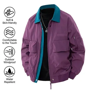 Vintage pilot bomber jacket in purple and teal with flap pockets and ribbed cuffs