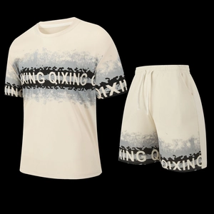 Detail of cream men's athletic set showing breathable honeycomb mesh and smoke print