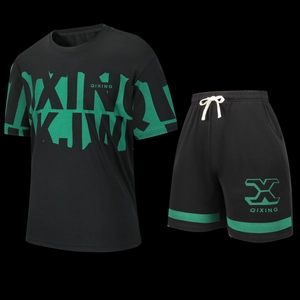 Detail of breathable mesh fabric on men's sports set with green QIXING graphics